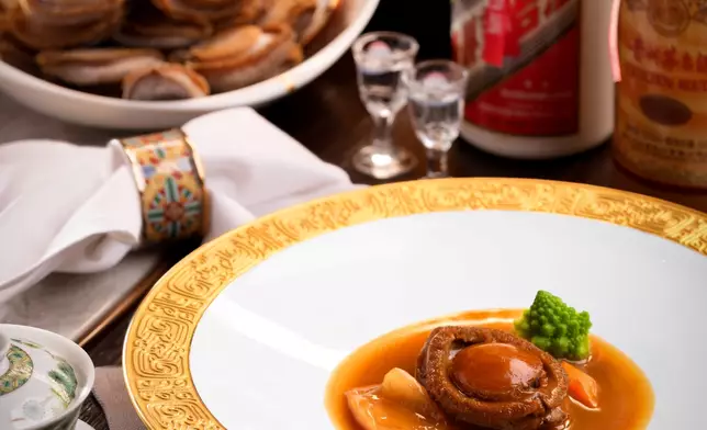 Roasted Goose with Fermented Black Bean and Mint alongside House of Origin Abalone infused with Moutai aromas, thoughtfully paired with rare aged Moutai, celebrating the timeless artistry and elegance of Cantonese gastronomy at