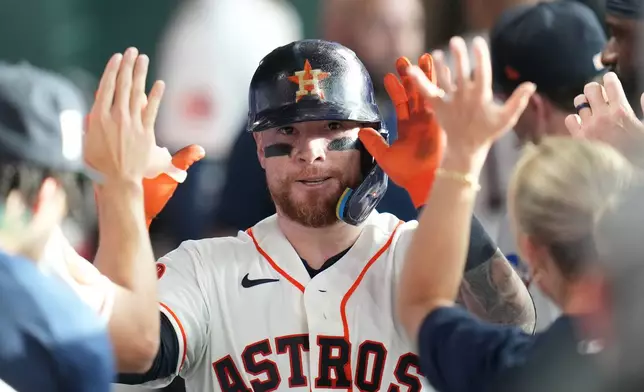 Houston Astros' Christian Vázquez celebrates his home run during the second inning of a baseball game against the Seattle Mariners, Saturday, August 15, 2026, in Houston. (AP Photo/Karen Warren)