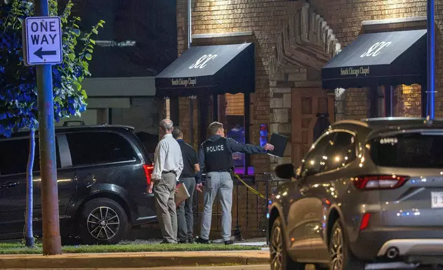 Chicago police investigate South Chicago Chapel after authorities discovered dozens of decomposing bodies in the funeral home's basement on Thursday, Aug. 6, 2026. (Tyler Pasciak /Chicago Sun-Times via AP)