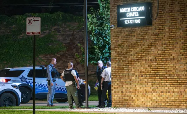 Chicago police investigate South Chicago Chapel after authorities discovered dozens of decomposing bodies in the funeral home's basement on Thursday, Aug. 6, 2026. (Tyler Pasciak LaRiviere/Chicago Sun-Times via AP)