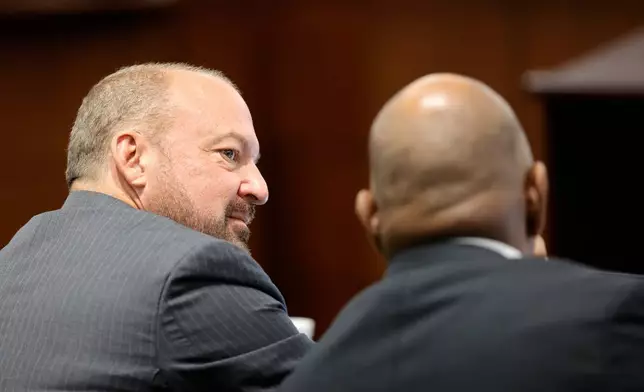 Chief Deputy District Attorneys Marc DiGiacomo, left, and Binu Palal confer during the third day of jury selection in the Duane Davis murder trial, related to the 1996 killing of rapper Tupac Shakur, at Clark County District Court Regional Justice Center on Wednesday, Aug. 12, 2026, in Las Vegas. (Steve Marcus/Las Vegas Sun via AP, Pool)