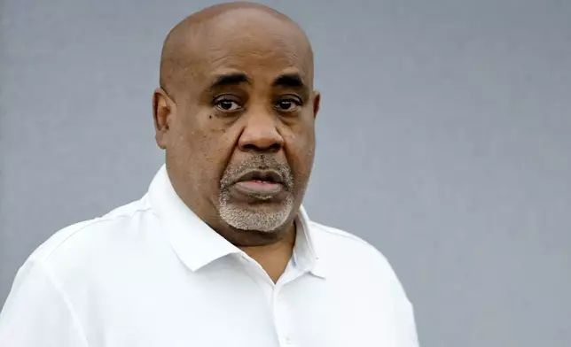 Duane Davis enters the courtroom after a break in the third day of jury selection in his murder trial, related to the 1996 killing of rapper Tupac Shakur, at Clark County District Court Regional Justice Center on Wednesday, Aug. 12, 2026, in Las Vegas. (Steve Marcus/Las Vegas Sun via AP, Pool)