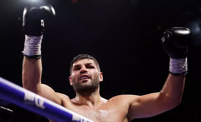Boxer Filip Hrgovic celebrates defeating Moses Itauma in their vacant IBF world heavyweight title, Saturday, Aug. 29, 2026, in London. (Steven Paston/PA via AP)
