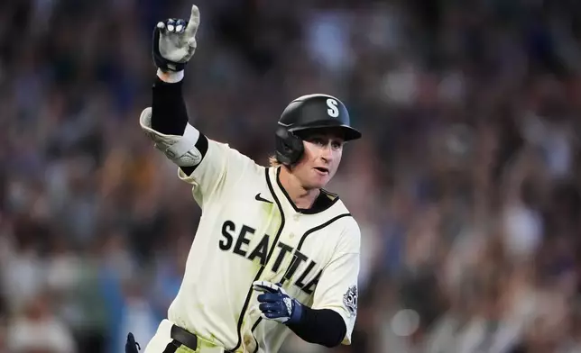 Seattle Mariners' Colt Emerson reacts after hitting a walk-off RBI single during the ninth inning to win a baseball game against the Minnesota Twins, Sunday, Aug. 2, 2026, in Seattle. (AP Photo/Lindsey Wasson)