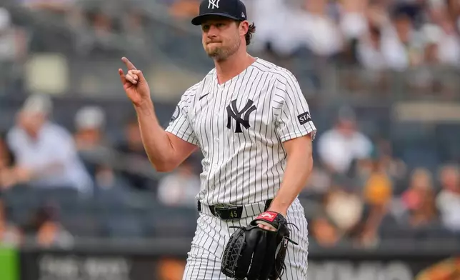 New York Yankees pitcher Gerrit Cole reacts after Atlanta Braves' Jim Jarvis strikes out during the seventh inning of a baseball game, Saturday, Aug. 8, 2026, in New York. (AP Photo/Yuki Iwamura)