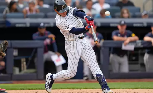 New York Yankees' George Lombard Jr. hits a home run during the seventh inning of a baseball game against the Atlanta Braves, Saturday, Aug. 8, 2026, in New York. (AP Photo/Yuki Iwamura)