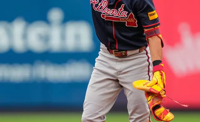 Atlanta Braves' Mauricio Dubón reacts after hitting a double during the fifth inning of a baseball game against the New York Yankees, Saturday, Aug. 8, 2026, in New York. (AP Photo/Yuki Iwamura)