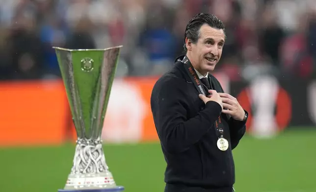 FILE - Aston Villa's head coach Unai Emery smiles after the Europa League final soccer match between Freiburg and Aston Villa in Istanbul, Turkey, Thursday, May 21, 2026. (AP Photo/Francisco Seco, File)