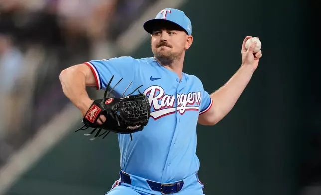 Texas Rangers pitcher Tyler Alexander throws to the Los Angeles Angels in the eighth inning of a baseball game Sunday, Aug. 23, 2026, in Arlington, Texas. (AP Photo/Tony Gutierrez)