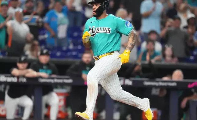 Miami Marlins' Agustin Ramirez runs to score on a single hit by Xavier Edwards during the sixth inning of a baseball game against the Washington Nationals, Sunday, Aug. 23, 2026, in Miami. (AP Photo/Lynne Sladky)