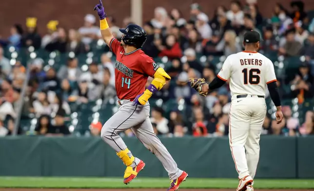Arizona Diamondbacks' Gabriel Moreno (14) rounds the bases after hitting a solo home run off Landen Roupp (not shown) in the fourth inning of baseball game in San Francisco, Thursday, Aug. 27, 2026. (Carlos Avila Gonzalez/San Francisco Chronicle via AP)