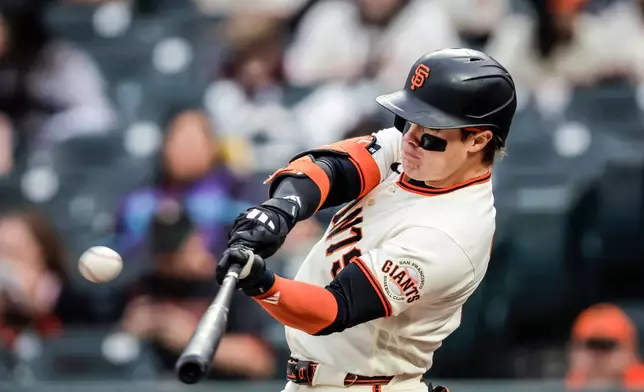 San Francisco Giants' Drew Gilbert (0) hits a solo home run against Arizona Diamondbacks’ Jose Cabrera (53) in the first inning of a baseball game at Oracle Park in San Francisco on Thursday, Aug. 27, 2026.(Carlos Avila Gonzalez/San Francisco Chronicle via AP)