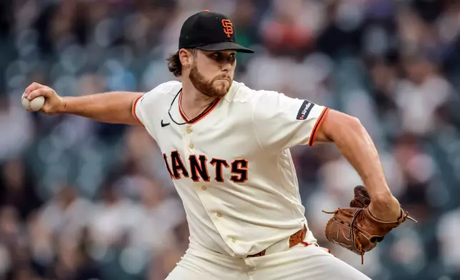 San Francisco Giants' Landen Roupp pitches in the first inning of a baseball game against the Arizona Diamondbacks in San Francisco, Thursday, Aug. 27, 2026. (Carlos Avila Gonzalez/San Francisco Chronicle via AP)