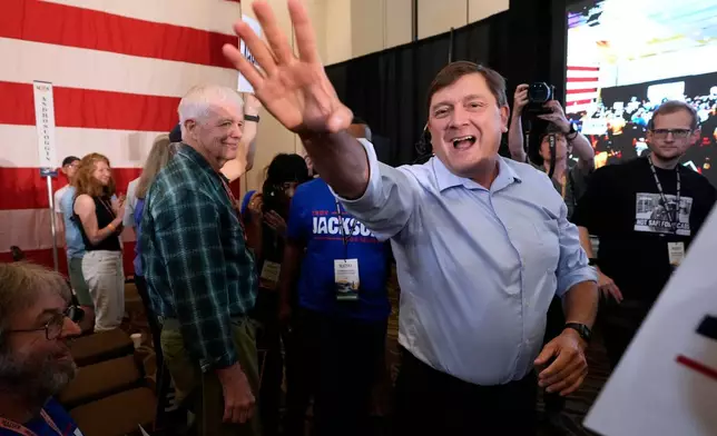 Troy Jackson, Democratic candidate for U.S. Senate, acknowledges supporters at the Maine Democratic Nominating Convention, Saturday, July 25, 2026, in Bangor, Maine. (AP Photo/Robert F. Bukaty)