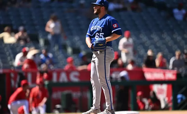 Kansas City Royals pitcher Noah Cameron prepares to deliver during the ninth inning of a baseball game against the Los Angeles Angels, Sunday, Aug. 16, 2026, in Anaheim, Calif. (AP Photo/William Liang)