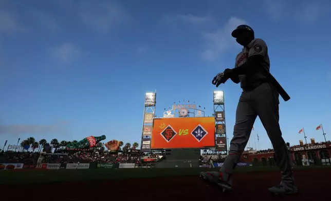 Houston Astros' Yordan Alvarez walks to the plate during the first inning of a baseball game against the San Francisco Giants in San Francisco, Monday, Aug. 10, 2026. (AP Photo/Jed Jacobsohn)