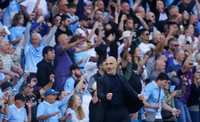 Manchester City's head coach Enzo Maresca reacts during the English Premier League soccer match between Manchester City and Bournemouth in Manchester, England, Sunday, Aug. 23, 2026. (AP Photo/Dave Thompson)