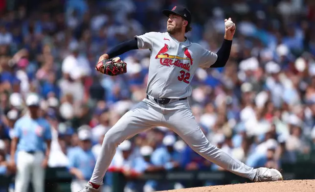 St. Louis Cardinals pitcher Matthew Liberatore (32) throws to a Chicago Cubs batter during the first inning of a baseball game in Chicago, Friday, Aug. 14, 2026. (AP Photo/Jessie Alcheh)