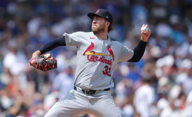 St. Louis Cardinals pitcher Matthew Liberatore (32) throws to a Chicago Cubs batter during the first inning of a baseball game in Chicago, Friday, Aug. 14, 2026. (AP Photo/Jessie Alcheh)