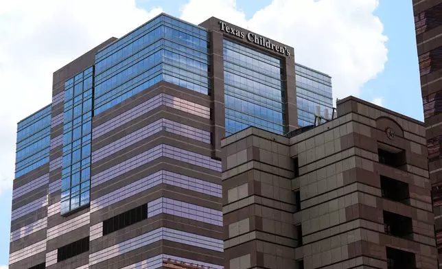 A portion of the Texas Children's Hospital campus is seen on Friday, Aug. 7, 2026, in Houston. (AP Photo/Ashley Landis)