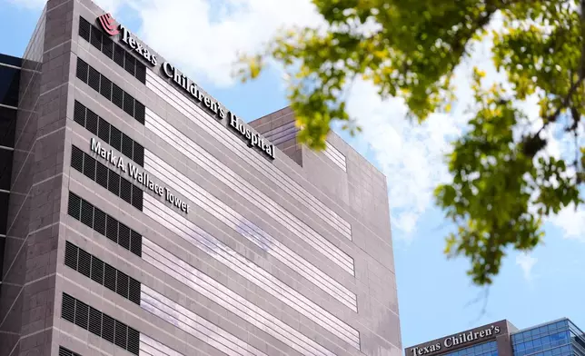 A portion of the Texas Children's Hospital campus is seen on Friday, Aug. 7, 2026, in Houston. (AP Photo/Ashley Landis)