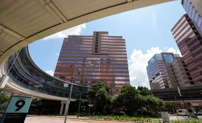 A portion of the Texas Children's Hospital campus is seen on Friday, Aug. 7, 2026, in Houston. (AP Photo/Ashley Landis)
