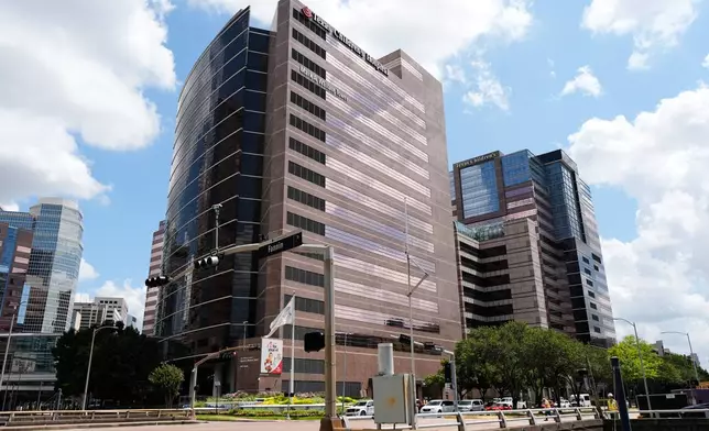 A portion of the Texas Children's Hospital campus is seen on Friday, Aug. 7, 2026, in Houston. (AP Photo/Ashley Landis)