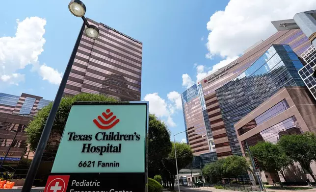 A portion of the Texas Children's Hospital campus is seen on Friday, Aug. 7, 2026, in Houston. (AP Photo/Ashley Landis)