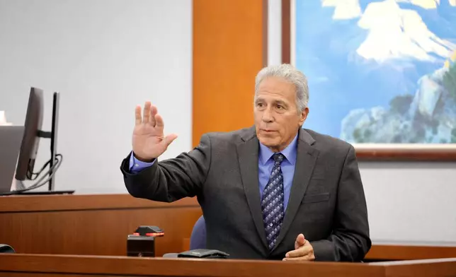 Former Las Vegas Metro Police Sgt. Stan Hyt testifies in court during the Duane Davis trial, related to the 1996 killing of rapper Tupac Shakur, in Clark County District Court at the Regional Justice Center in Las Vegas on Thursday, Aug. 27, 2026. (Steve Marcus/Las Vegas Sun via AP, Pool)