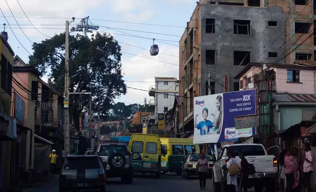 A cable car operates during testing in Antananarivo, Madagascar, Sunday, April 6, 2025. (AP Photo/Alexander Joe)
