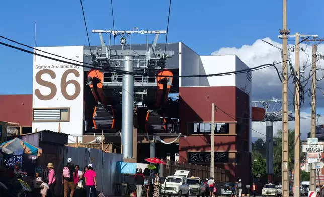 Cable cars at a station during testing in Antananarivo, Madagascar, Sunday, April 6, 2025. (AP Photo/Alexander Joe)