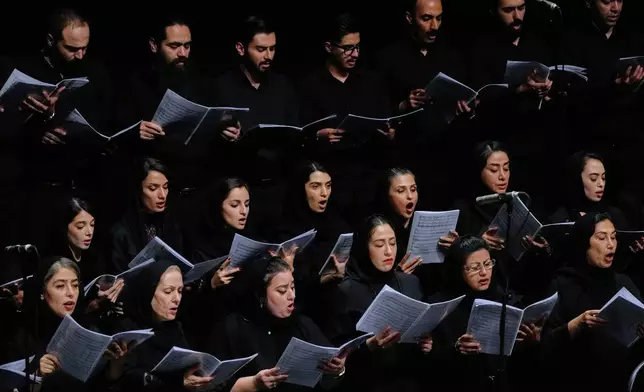Choir performs in a Tehran Symphony Orchestra performance at Unity Hall in Tehran, Iran, Thursday, Aug. 6, 2026. (AP Photo/Vahid Salemi)