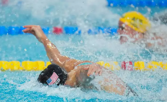 Gretchen Walsh, of the United States, competes in the women's 50-meter butterfly final at the Pan Pacific Swimming Championships in Irvine, Calif., Wednesday, Aug. 12, 2026. (AP Photo/Jae C. Hong)