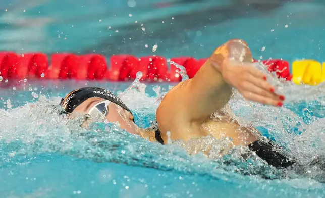Summer McIntosh, of Canada, competes in the women's 200-meter freestyle final at the Pan Pacific Swimming Championships in Irvine, Calif., Wednesday, Aug. 12, 2026. (AP Photo/Jae C. Hong)