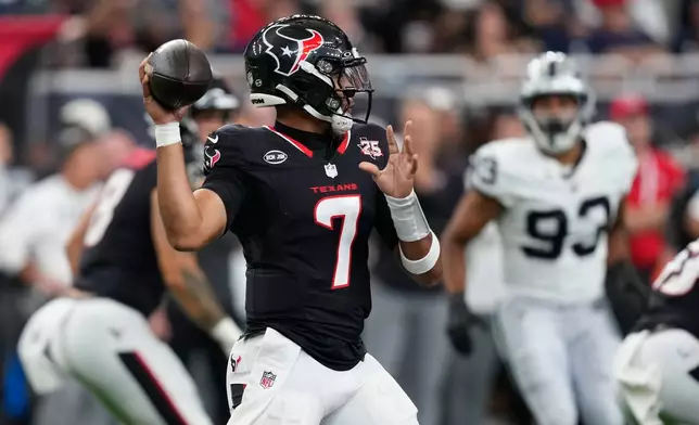 Houston Texans quarterback C.J. Stroud (7) throws against the Las Vegas Raiders during the first half of an NFL preseason football game, l Thursday, Aug. 20, 2026, in Houston. (AP Photo/David J. Phillip)