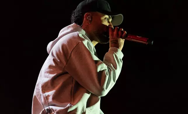 FILE - Puerto Rican singer Jay Wheeler performs during the Coca-Cola Flow Fest music festival in Mexico City, Nov. 24, 2024. (AP Photo/Felix Marquez, File)