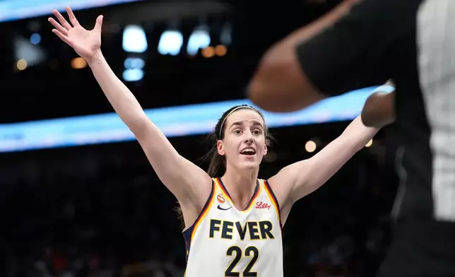 Indiana Fever guard Caitlin Clark (22) reacts in the first half of an WNBA basketball game against the Atlanta Dream Sunday, Aug. 16, 2026, in Atlanta. (AP Photo/Brynn Anderson)