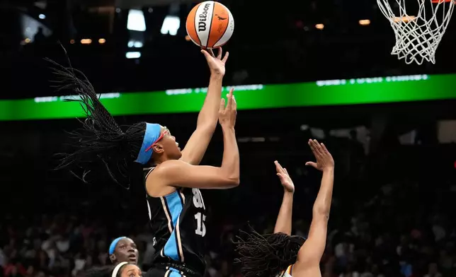 Atlanta Dream guard Allisha Gray (15) scores in the first half of an WNBA basketball game against the Indiana Fever Sunday, Aug. 16, 2026, in Atlanta. (AP Photo/Brynn Anderson)