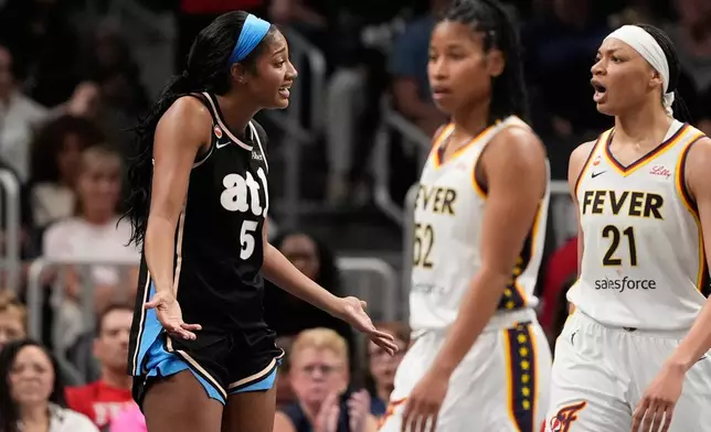 Atlanta Dream forward Angel Reese (5) reacts in the first half of an WNBA basketball game against the Indiana Fever Sunday, Aug. 16, 2026, in Atlanta. (AP Photo/Brynn Anderson)