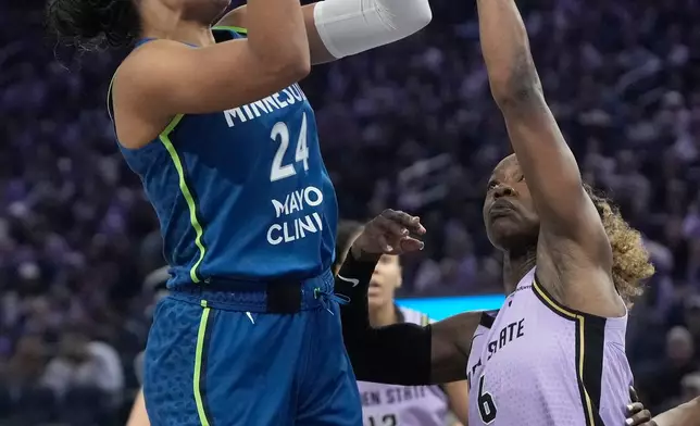 Minnesota Lynx forward Napheesa Collier (24) shoots against Golden State Valkyries guard-forward Kaila Charles (6) during the first half of a WNBA basketball game in San Francisco, Wednesday, Aug. 19, 2026. (AP Photo/Jeff Chiu)