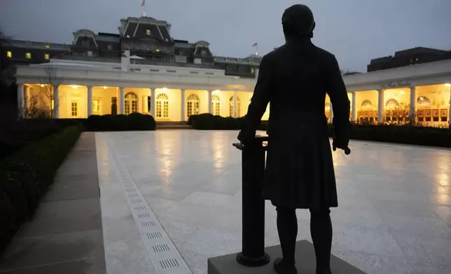 FILE - A statue of Alexander Hamilton is seen in the Rose Garden at the White House, March 6, 2026, in Washington. (AP Photo/Julia Demaree Nikhinson, File)