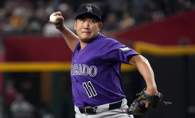 Colorado Rockies pitcher Tomoyuki Sugano throws against the Arizona Diamondbacks in the first inning of a baseball game, Tuesday, Aug. 11, 2026, in Phoenix. (AP Photo/Rick Scuteri)