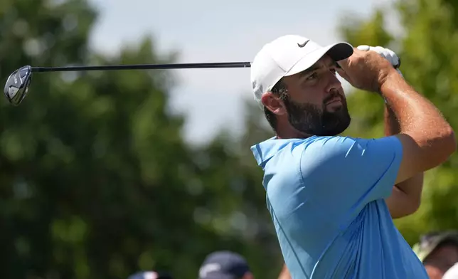 Scottie Scheffler hits from the second tee in the final round of the BMW Championship golf tournament, Sunday, Aug. 23, 2026, in St. Louis. (AP Photo/Jeff Roberson)