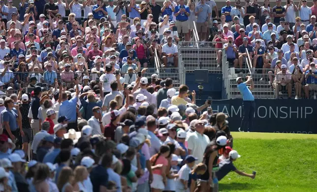 Scottie Scheffler hits from the first tee in the final round of the BMW Championship golf tournament, Sunday, Aug. 23, 2026, in St. Louis. (AP Photo/Jeff Roberson)