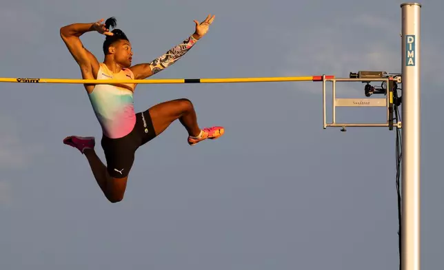 Emmanouil Karalis, of Greece, competes in the men's pole vault competition at the Diamond League athletics city meet in Lausanne in Lausanne, Switzerland, Thursday, August 20, 2026. (Jean-Christophe Bott/Keystone via AP)