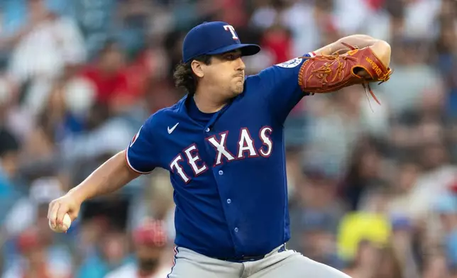 Texas Rangers starting pitcher Cal Quantrill works against a Los Angeles Angels batter in the first inning of a baseball game Wednesday, Aug. 12, 2026, in Anaheim, Calif. (AP Photo/Karl Anderson)