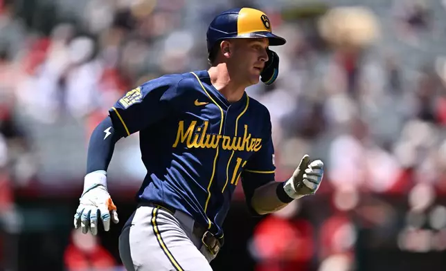 Milwaukee Brewers' Cooper Pratt runs after hitting a single during the fifth inning of a baseball game against the Los Angeles Angels, Sunday, Aug. 2, 2026, in Anaheim, Calif. (AP Photo/William Liang)