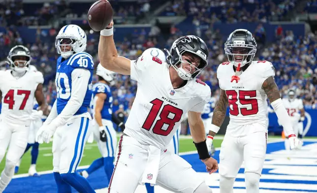 Atlanta Falcons quarterback Jack Strand (18) celebrates a touchdown against the Indianapolis Colts during the second half of an NFL football game in Indianapolis, Saturday, Aug. 22, 2026. (AP Photo/AJ Mast)