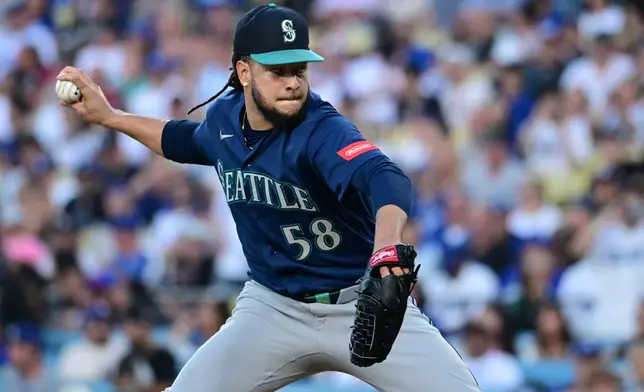 Seattle Mariners starting pitcher Luis Castillo (58) throws a pitch against the Los Angeles Dodgers during the first inning of a baseball game Tuesday, July 28 2026, in Los Angeles. (AP Photo/Wally Skalij)