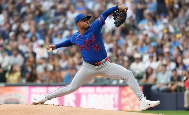 New York Mets' Freddy Peralta pitches during the first inning of a baseball game against the Milwaukee Brewers, Monday, July 20, 2026, in Milwaukee. (AP Photo/Aaron Gash)